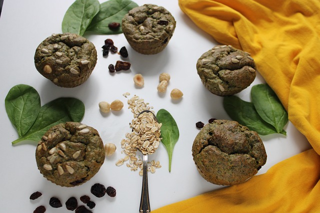 Green chocolate muffins with oat sprinkles, set on a white table to enjoy a Happy St. Patrick’s day
