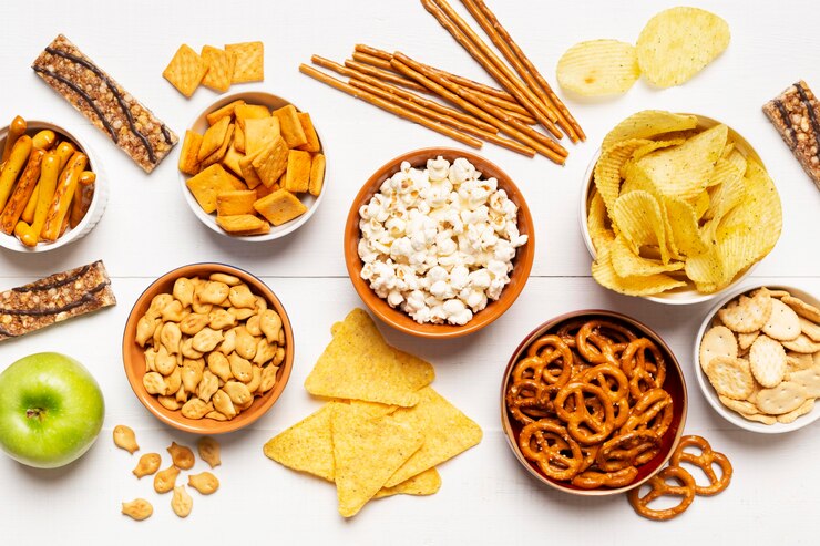Prosecco cocktails with vodka: An apple, tortilla chips, pretzels, popcorn and a variety of salty snacks for National Prosecco Day