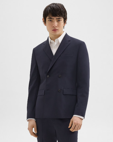 A man wearing the Morton Double-Breasted Blazer in Stretch Wool from Theory