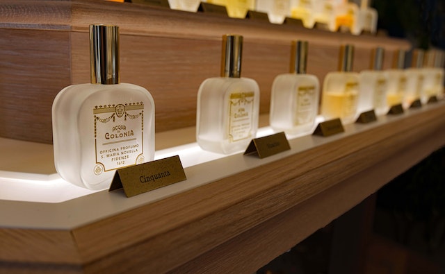 Image: Various bottles of men’s fragrances on display on a shelf inside a store Various bottles of men’s fragrances on display on a shelf inside a store