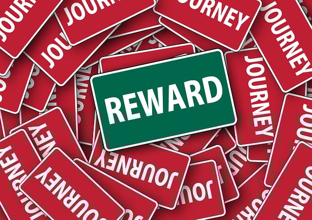 Image: New Year savings challenge: Green reward sign with different red signs in the background New Year savings challenge: Green reward sign with different red signs in the background