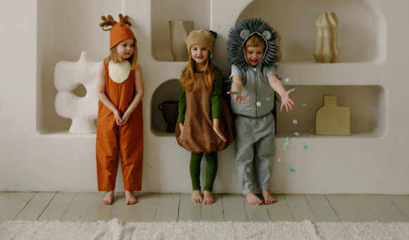 Dressing-up ideas for World Book Day: Three children dressed up as their favourite book characters.