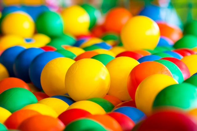 how to make money on Amazon: A close-up of brightly coloured balls in a pit