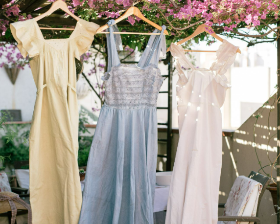3 Dresses displayed on hangers from the Dorothy Perkins dress sale