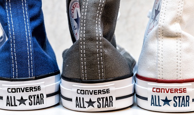 Blue, grey and white Schuh men’s Converse put together.