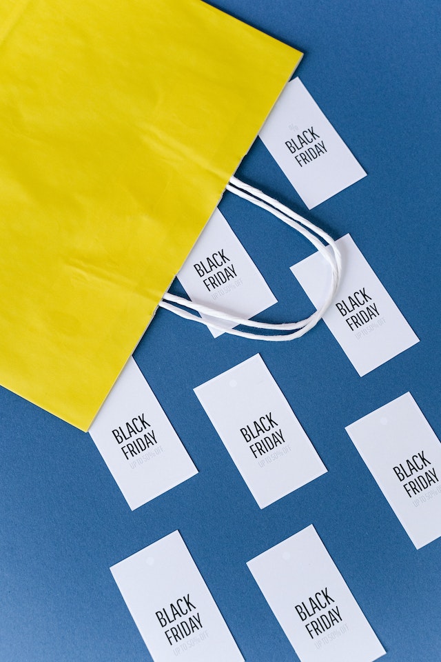 Till slips with ‘Black Friday’ printed on them falling out of a shopping bag