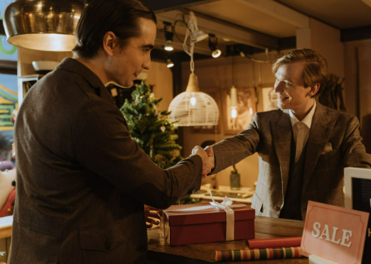 A man shaking hands with the sales man because he got the best deal on his Tenways e-bike.