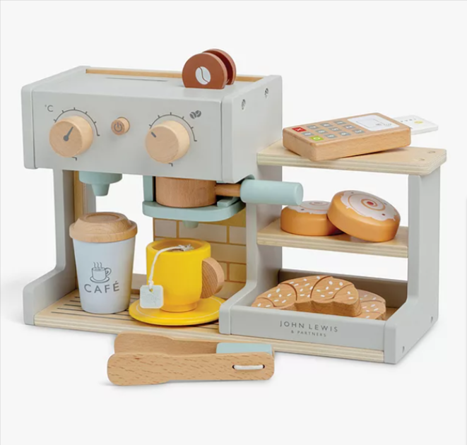 A wooden John Lewis coffee shop playset sat in front of a white background