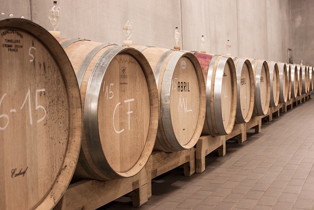 Row of wine barrels all ready to be dispensed in bottles for National Cheese and Wine Day.