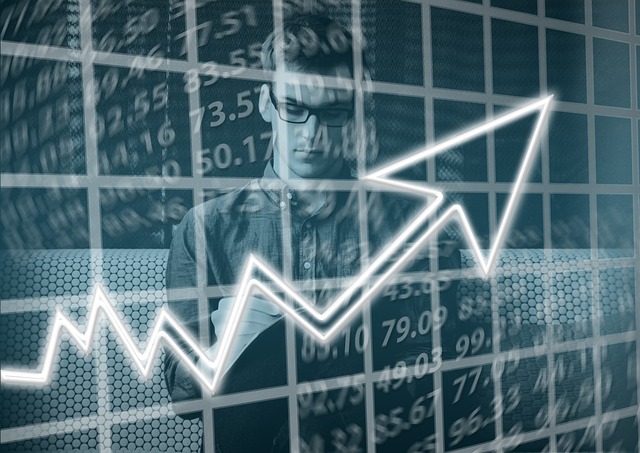 Capital allowances investments arrow going up with male noting down improvements