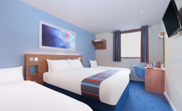 Image: A bedroom in the Travelodge Hotel: A cheap hotel in Manchester A bedroom in the Travelodge Hotel: A cheap hotel in Manchester