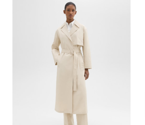 Theory clothes on sale: A woman wearing a white wrap trench coat from Theory