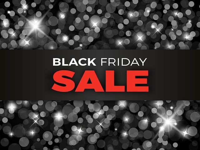 Black Friday sale sign in black and red with a starred-effect background.