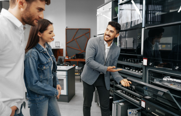 Appliances in the home: A couple shopping for home appliances at an appliance store