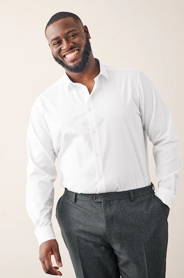 A man wearing the Cotton Single Cuff white shirt from Next