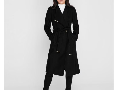 A woman wearing a Ted Baker coat from the best-selling House Of Fraser coats range.