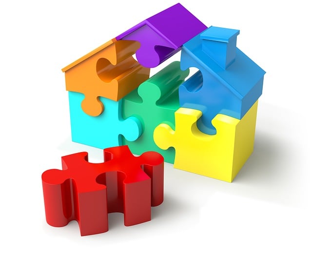 Puzzle home with different colour puzzle pieces for your home insurance.
