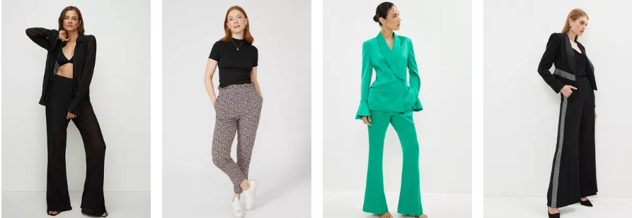 Different women models wearing different coloured trousers on a neutral background.