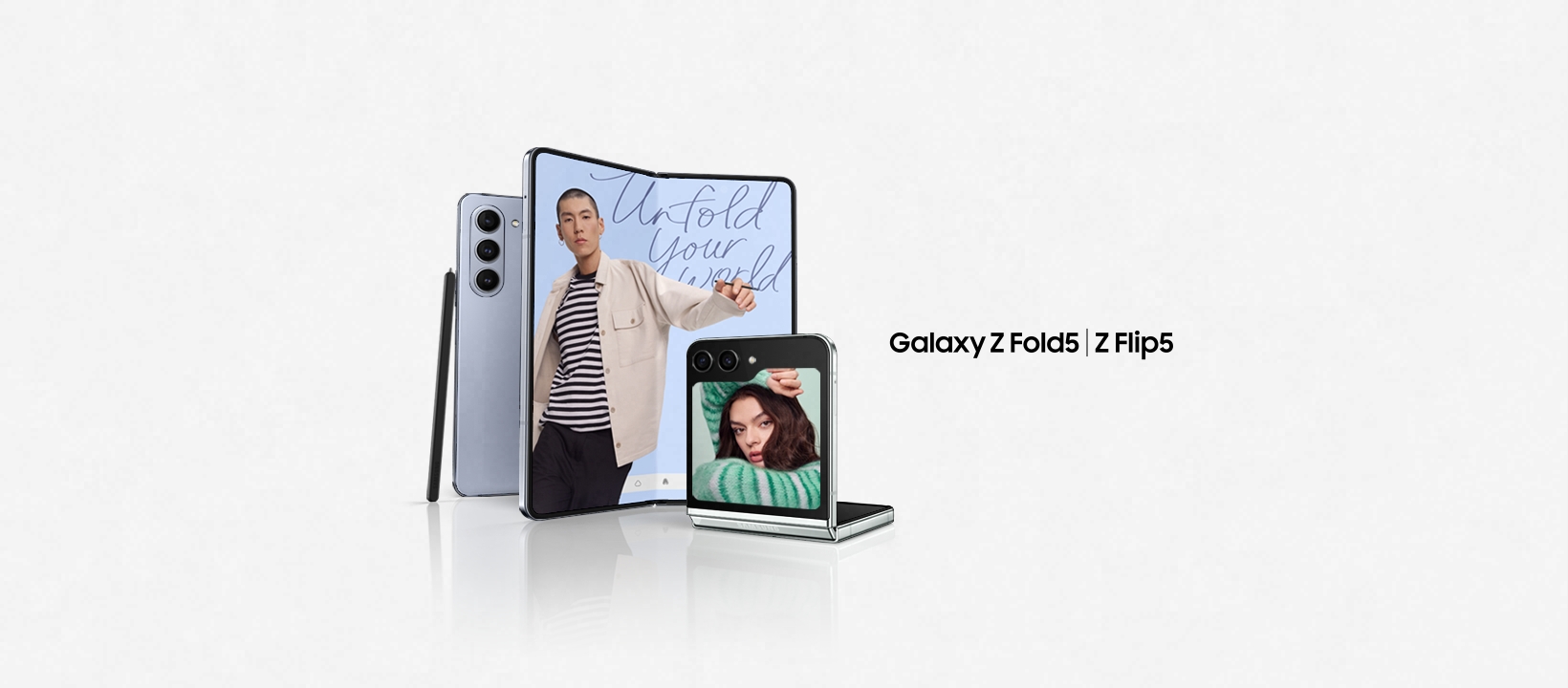 Image: Three Samsung Galaxy Fold phones and a stylus pen standing on a white background Three Samsung Galaxy Fold phones and a stylus pen standing on a white background