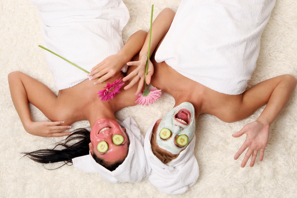 Image: Mother’s Day spa deals - Two women wearing face masks lying down and looking excited. Mother’s Day spa deals - Two women wearing face masks lying down and looking excited.