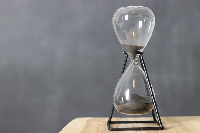 Easy canapes to make ahead: hourglass on an oak table