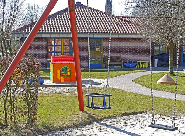 Children’s playground with swings and playing equipment for the little ones