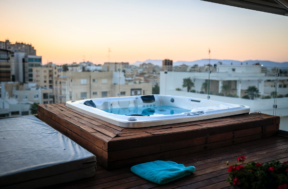 One of the hot tubs on eBay outside on a balcony