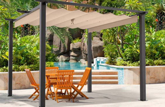 Rattan garden furniture sets: An outdoor pergola with a wooden garden table and chairs placed underneath it.