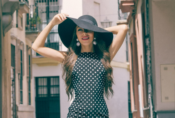 A women wearing one of the dresses from the Monsoon dresses on sale range
