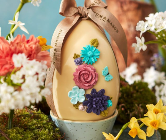 Image: Fortnum & Mason luxury Easter eggs: White chocolate decorated Easter egg with a ribbon Fortnum & Mason luxury Easter eggs: White chocolate decorated Easter egg with a ribbon
