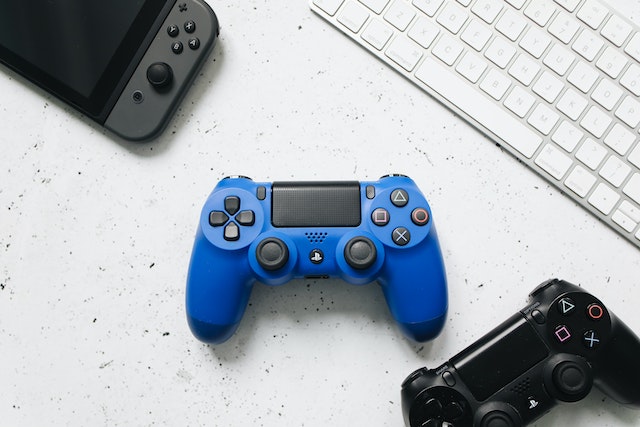A Nintendo Switch, two controllers and a gaming laptop worth under £500