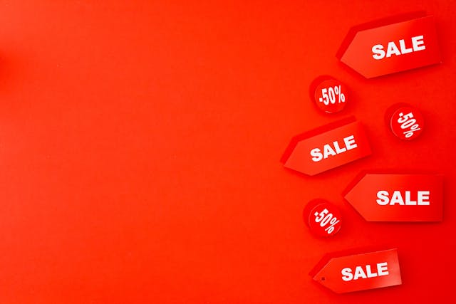 Labor Day sales: Red sales and discount tags placed on a red background