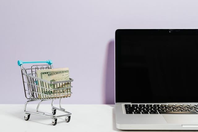 Best Labor Day weekend sales: A mini shopping cart next to a laptop