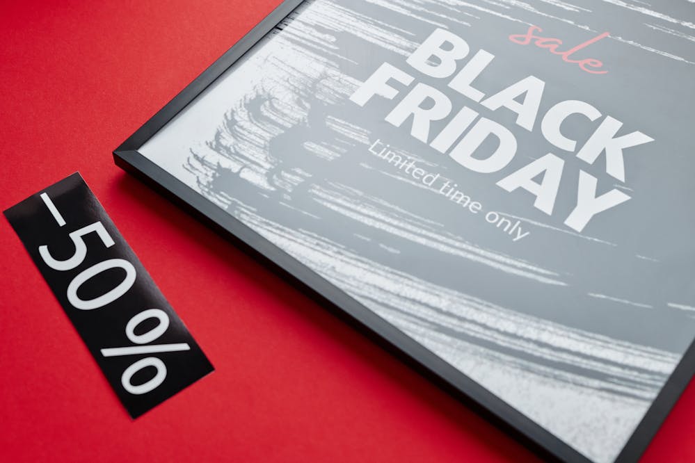 Online shopping deals for Black Friday: A Black Friday sale sign with a red background