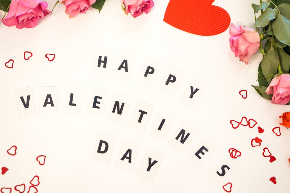 Cheap date ideas for Valentine's Day: A Valentine’s Day banner with hearts and flowers
