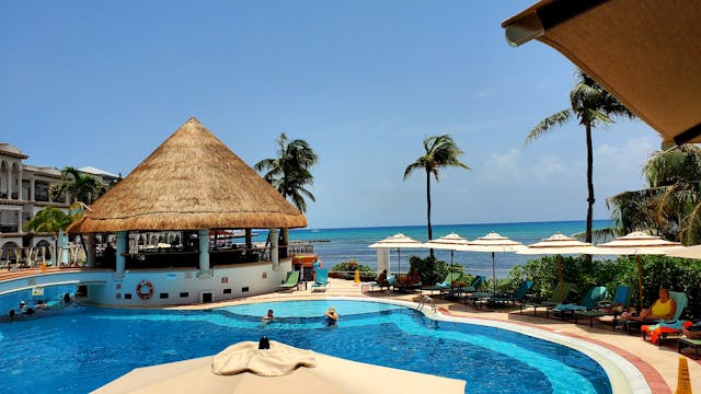 All-inclusive holiday deals: A holiday beach resort with a swimming pool