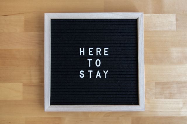 Ireland Staycations: A black and white board spelling out ‘Here to stay’