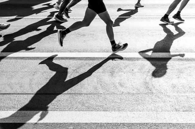 Best Under Armour running shoes: A group of people running on a road