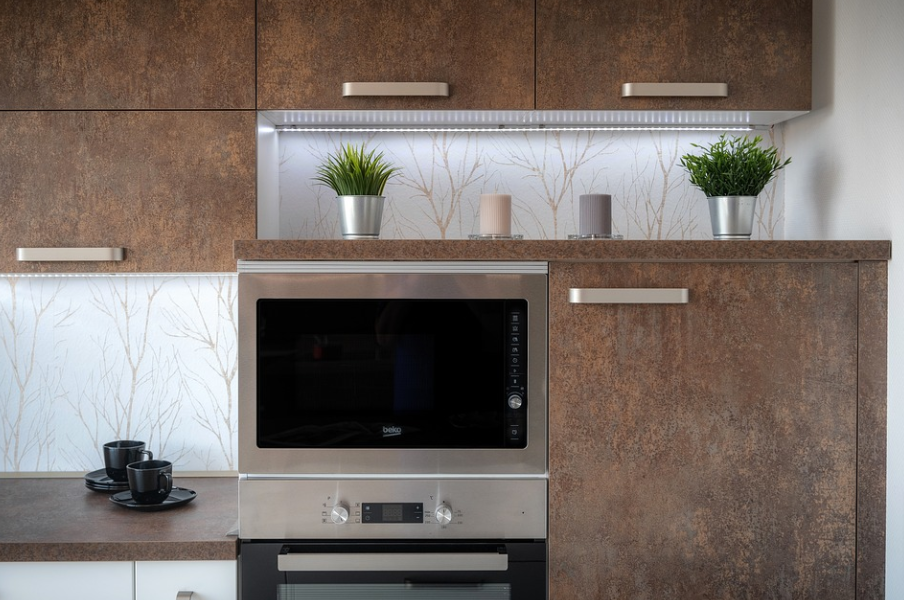kitchen interior with the oven installed in the kitchen wall