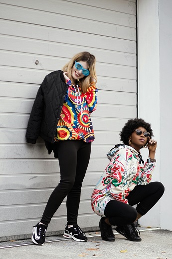 image showing two women wearing stylish hoodies you can purchase from NICCE