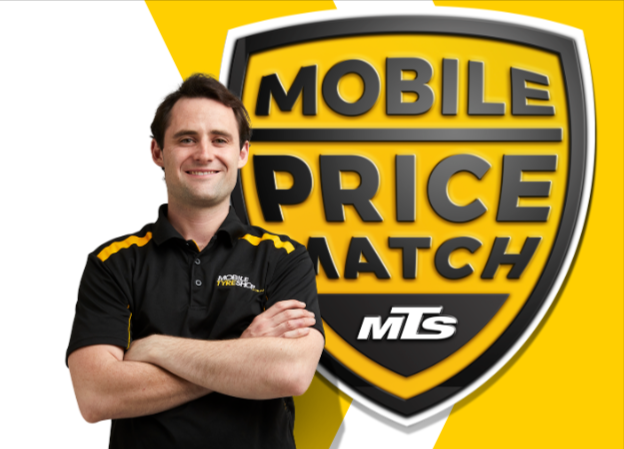 A man is standing in front of the Mobile Tyre Shop price match.