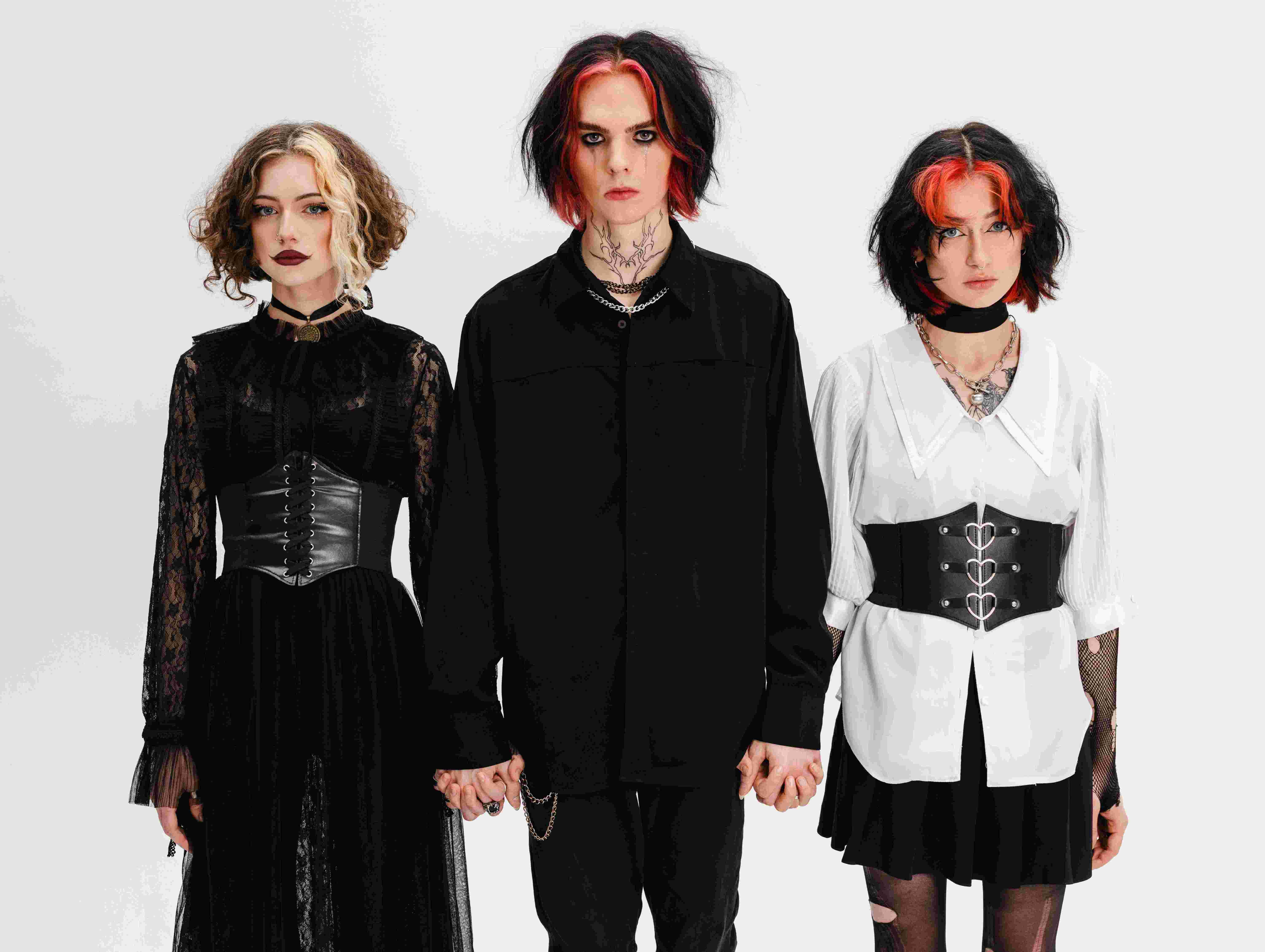 front-view-goth-friends-posing-studio