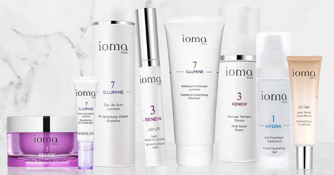 A range of Ioma Paris products including cleanser, toner,lip care, moisturiser, and more on a marble surface