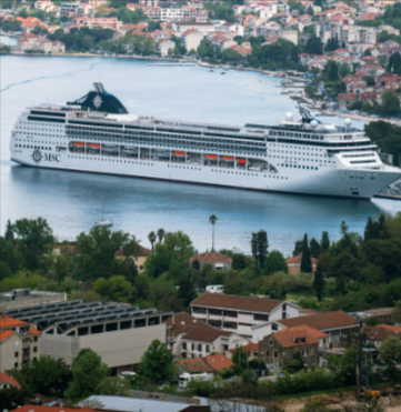 Aerial view of an MSC Cruise ship in Kotor Bay