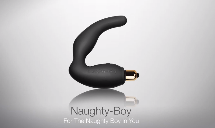 Naughty Boy vibrator on a white background with “Naughty-Boy For The Naughty Boy In You” below it