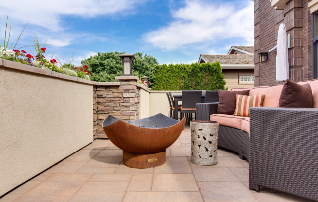 A Bed Bath & Beyond online coupon used to purchase outdoor furniture on a balcony