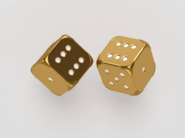 cette image présente deux  dés couleurs or qui servent aux jeux de hasard. N'oubliez pas les coupons ici-turf
