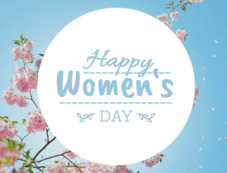 Eine Aufschrift mit Verweis auf den Weltfrauentag mit Blumen drumherum