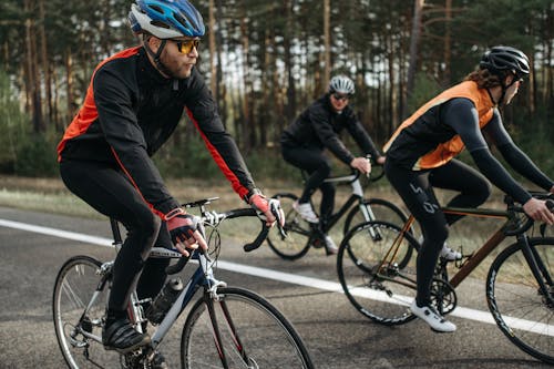 3 people riding bikes from Freewheel that they saved on with a Freewheel voucher code