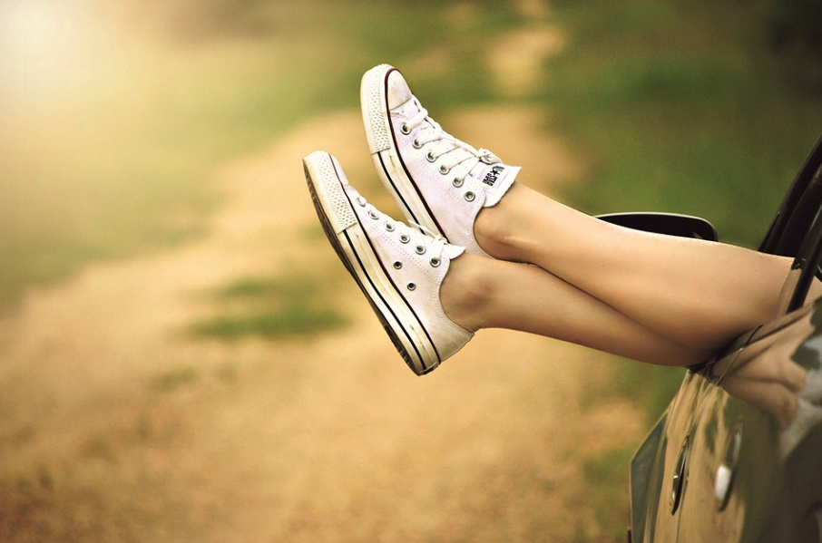 white takkies with legs out car using a FINN discount